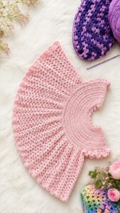 Pink crochet baby dress for 0 to 3 months, handmade in Kerala